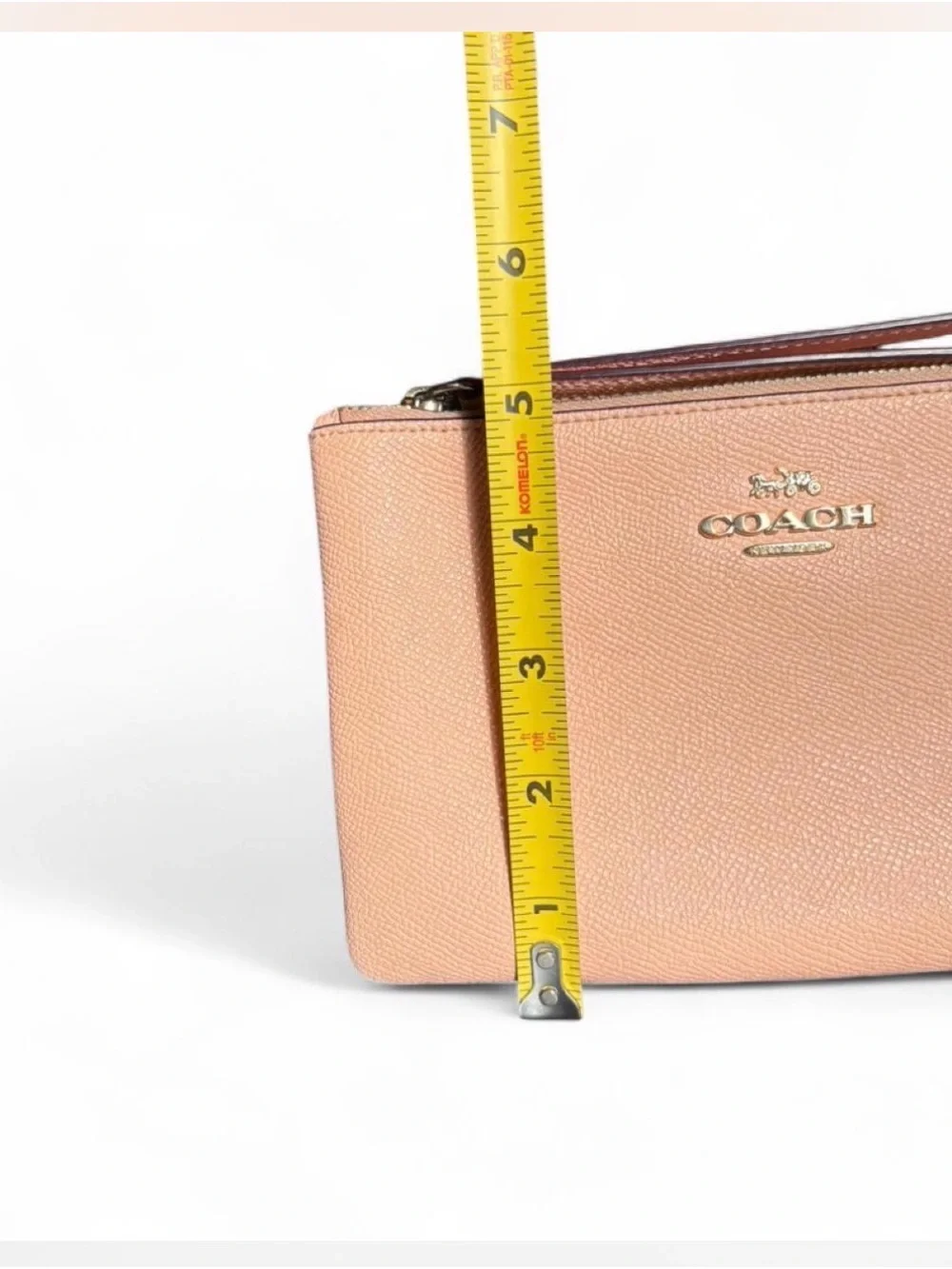 Coach Pebbled Leather Wristlet in Peach